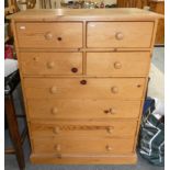 A pine 4+2 height chest of drawers, 125cm tall, 91cm long, 50cm deep.