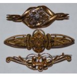 Two 9ct bar brooches, together with a 15ct bar brooch (3).
