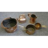 A graduated set of five saucepans, a copper coal scuttle, a copper kettle and a water jug (8).