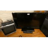 A TXL24 Panasonic LCD television, together with a Sony solid state portable television (2).