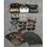 A quantity of glasses and sun glasses, marked Gucci, Tom Ford, Diesel, Orao and various other