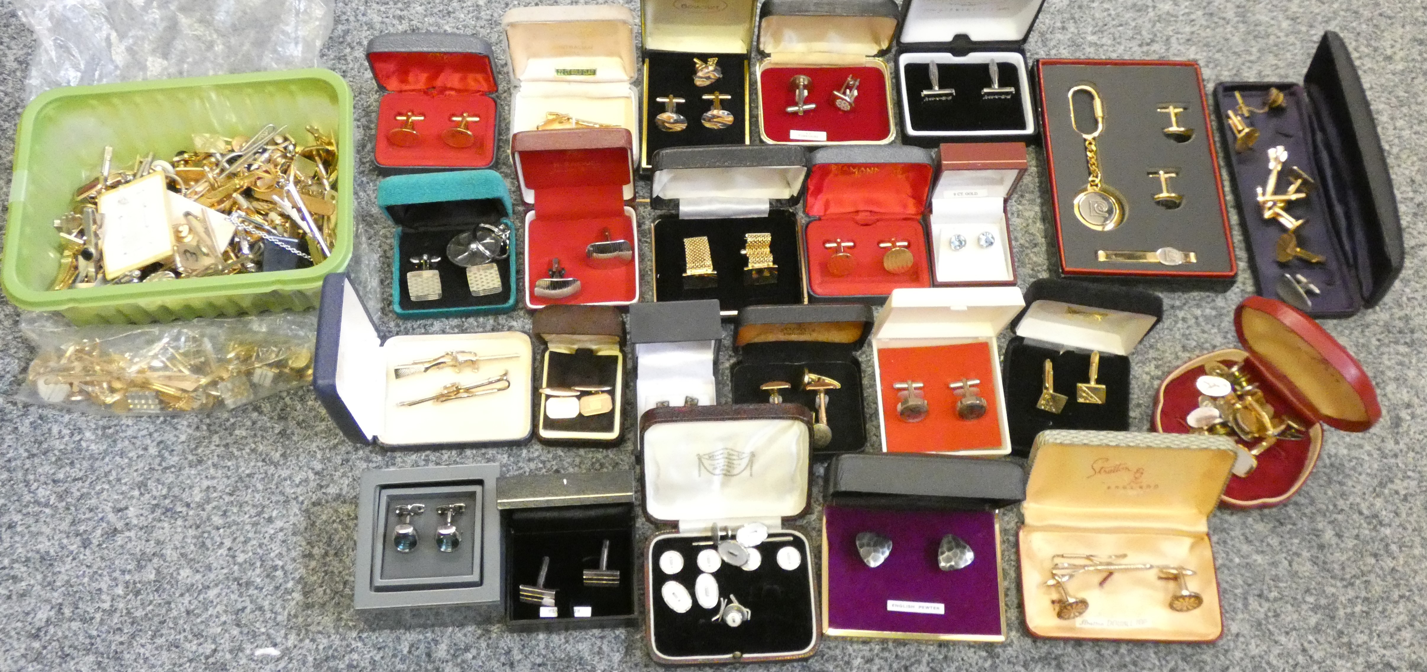 A large quantity of cuff-links