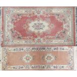 A pink and cream rug, approx 180x280cm and a salmon and cream runner, approx 70x250cm (2)