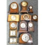 An Edwardian mahogany and boxwood inlaid mantle clock and other mantle clocks (2)