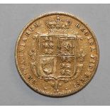 An 1874 Young Head Victorian shield back half sovereign