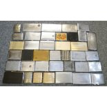A large quantity of EPNS and gilt metal cigarette cases