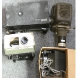 A Bell and Howell slide projector, an Aldis slide projector and two other projectors