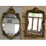 An oval gilt framed mirror with chrubs, 72x46cm and another, 58x38cm (2)