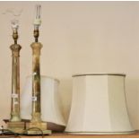 A pair of green onyx table lamps raised on square bases, 58cm with non matching shades