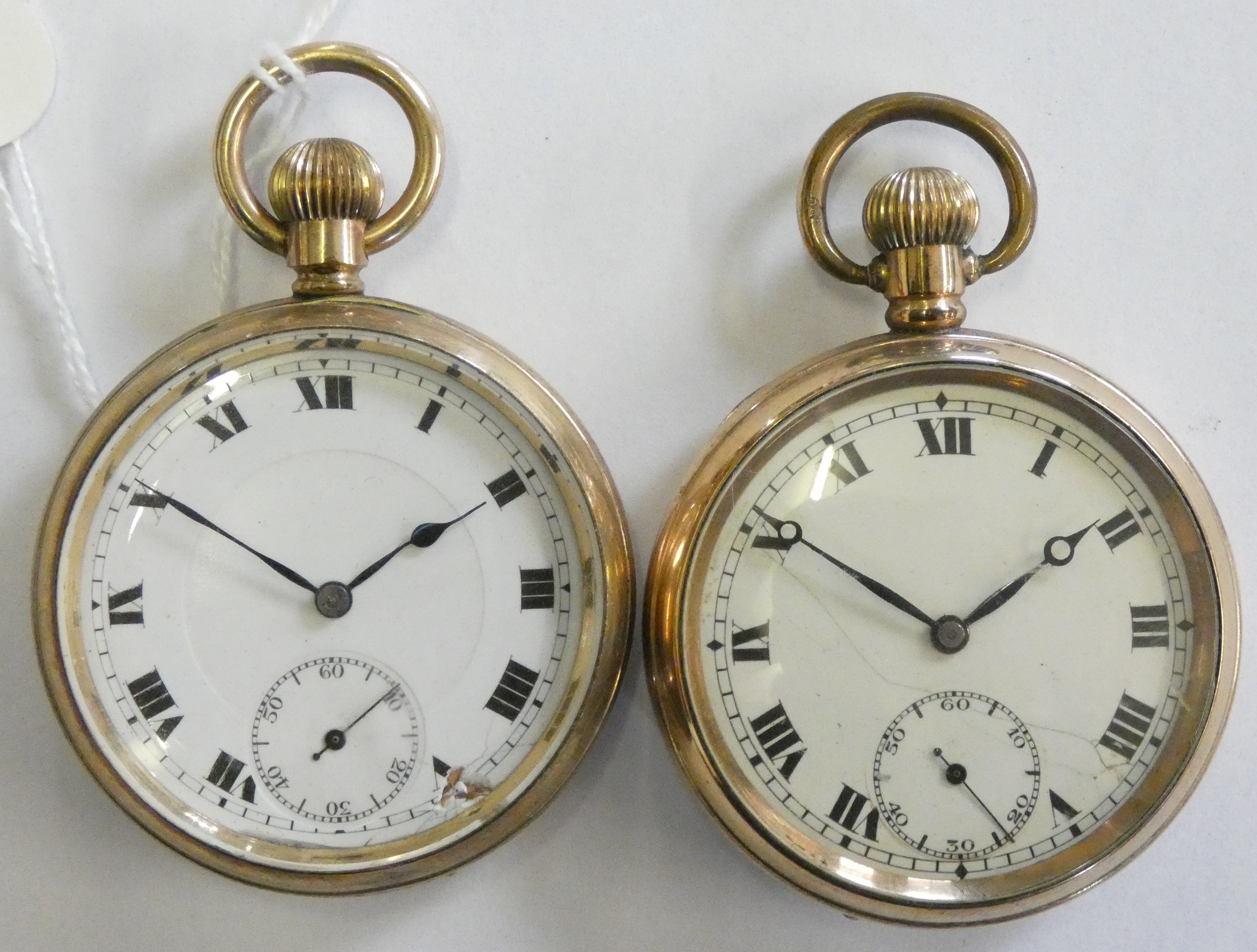 Two keyless wind open face pocket watches, case