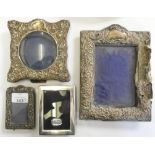 A silver mounted photograph frame Birmingham 1904. and three other silver photograph frames