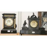 A black slate mantle clock with exposed movement and another with cast hunting scenes and one Marley