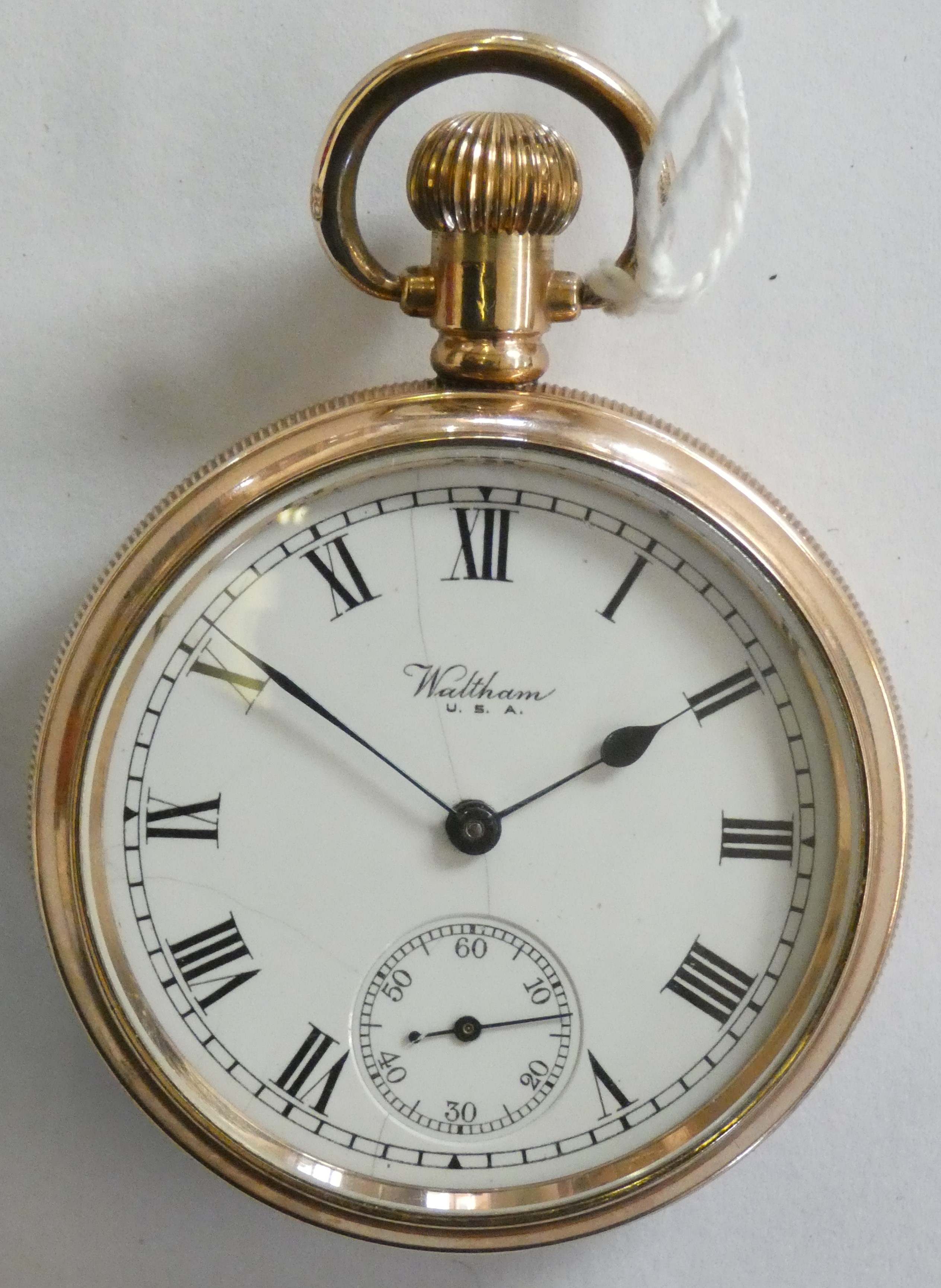 A Waltham keyless wind open face pocket watch