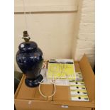 A blue pottery table lamp and 20 compact flourescent 2 D 28W 2 pin bulbs