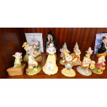 A group of Royal Doulton ?Snow White and the Seven Dwarves? figures, to include HN3848 The Witch No.