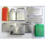 A chrome combination cigarette case and compact together with eight combination cigarette case and
