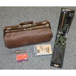 A vintage doctors medicinal satchel, containing boxed blood pressure monitor and various syringes,