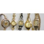 A 9ct gold ladies Rotary wristwatch, weight without movement 9 grams, and four other watches