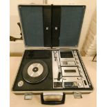 A Sanyo portable solid state stereo music centre, model G-2615N in fold up attach case