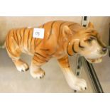 A mid-20th century Royal Dux porcelain model of a tiger, marked No. 312, hand painted, made in