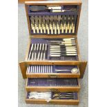 A three drawer canteen chest of cutlery by Jeff Round & Son Sheffield, to include sauce ladle,