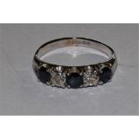 A 9ct white gold sapphire and diamond five stone ring, 2 grams