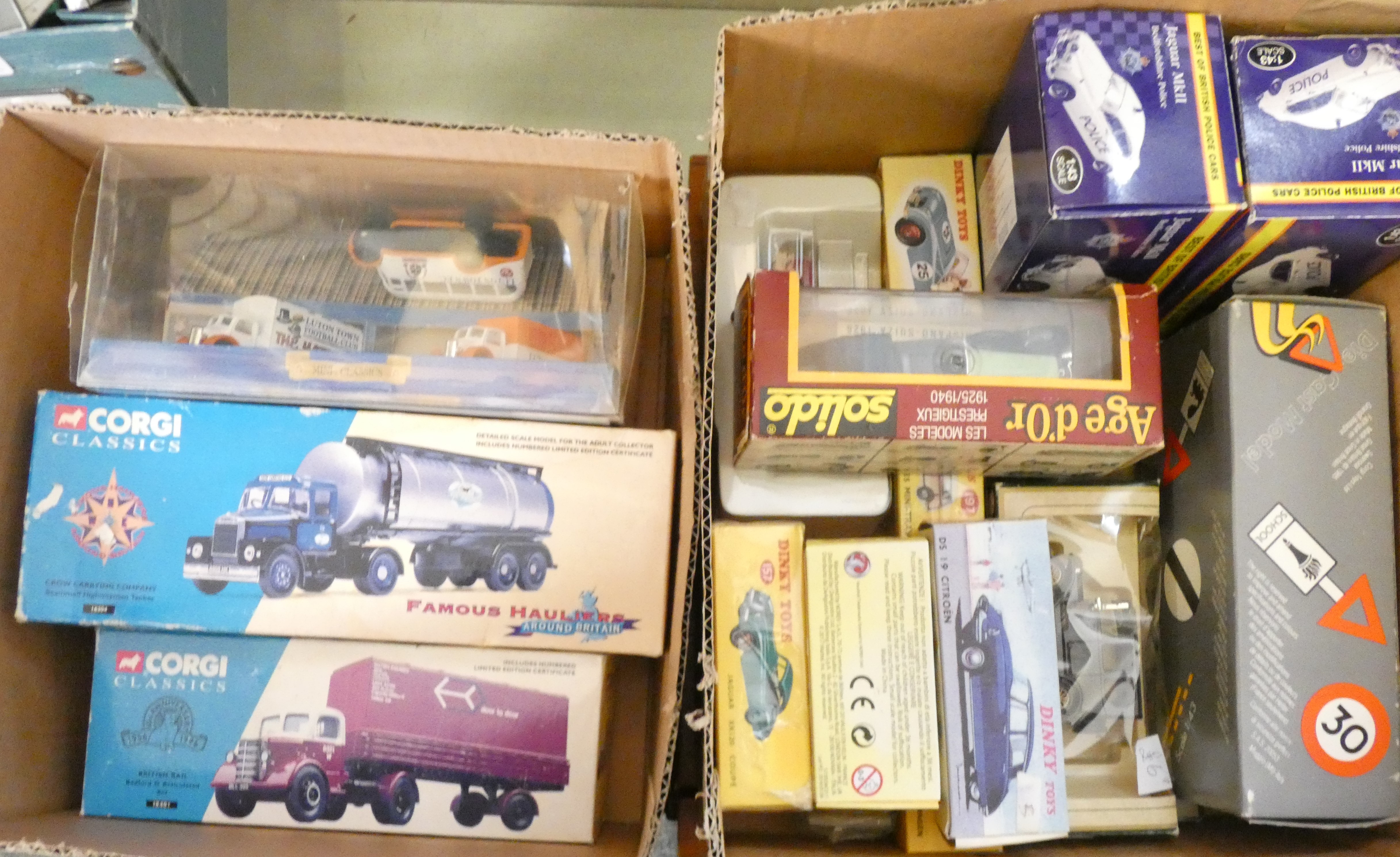 Two boxes of assorted boxed die-cast models, to include a Jaguar MkII (Bedfordshire Police),