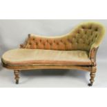 A Victorian rosewood chaise longue, the button back 3/4 upright with separate padded seat, carved