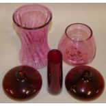 Five pieces of Victorian cranberry glassware, to include a pair of squat vases, a slim wasted vase
