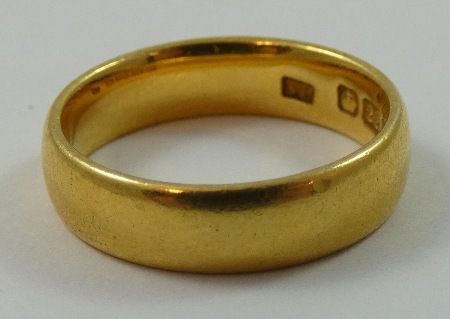 A 22 ct gold wedding band, 5 gms. - Image 2 of 2