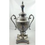 A Victorian electroplated samovar, of urn form with bright cut engraved decoration, raised on a