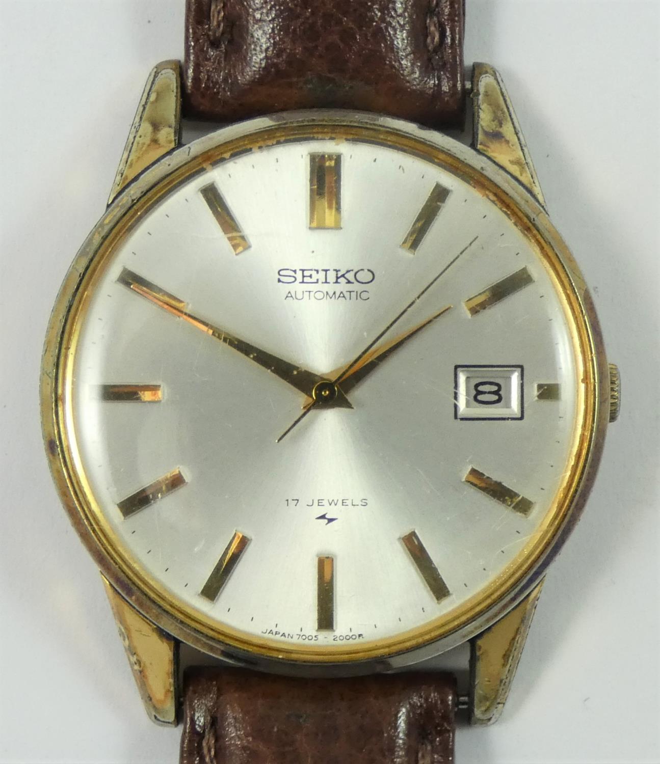 A Seiko, gentleman's automatic date wristwatch, circa 1971, the silvered dial with baton markings,