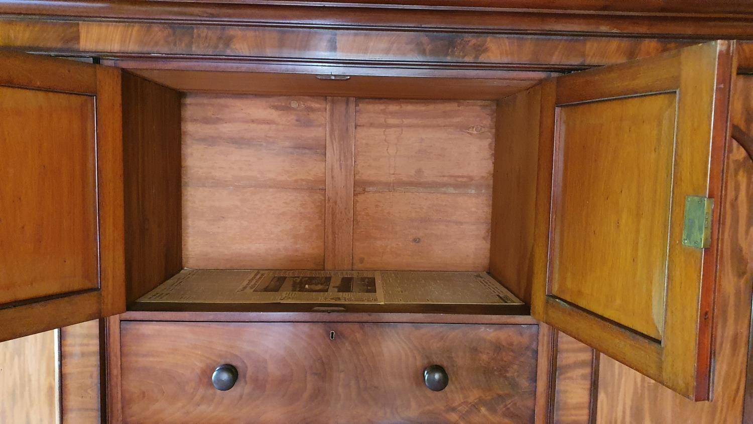 A 19th century mahogany wardrobe, the central cupboard over four graduated drawers, the right - Image 2 of 4