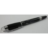 Mont Blanc, a Starwalker rollerball, MDL33964L, with mottled resin body, black cap and base.