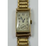 A 9ct gold Art Deco manual wind gentleman's wristwatch, Edinburgh 1937, the rectangular silvered