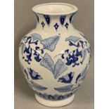 A Chinese blue and white baluster vase, decorated with floral sprays, blue character seal mark, 31