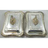 A pair of electroplated entree dishes, of rectangular form, with shell and gadrooned borders,