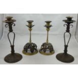 A pair of Arts & Craft copper and brass candlesticks, possibly by W.A.S. Benson, raised on