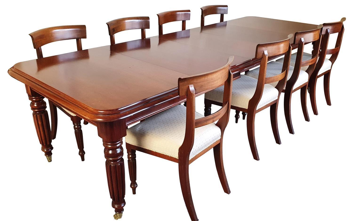 A Victorian style mahogany extending dining table with eight chairs, by John Mason of Lockington,