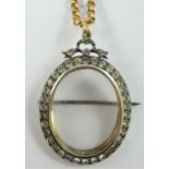 A 19th century paste and gold locket/brooch/pendant, bearing control marks, the silver set paste
