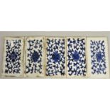 A set of five 19th century Islamic blue and white pottery panels, 14 x 7 cm.
