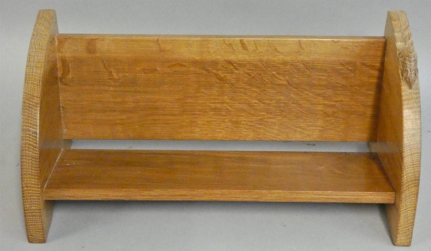 Robert Mouseman Thompson, an adzed oak table top bookshelf, with carved mouse signature to one