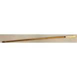 An early 20th century ivory topped bamboo cane, the handle carved and initialled M.P.R., length 88