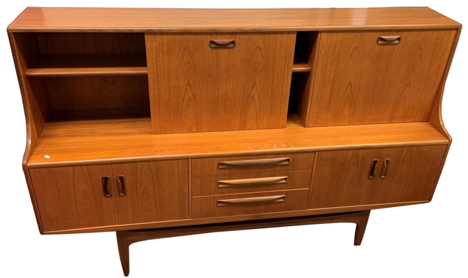 A G-Plan teak Fresco sideboard, circa 1960's, the upper section with drop down drinks cupboard to
