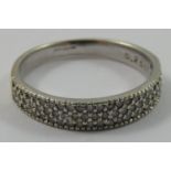 A 9 ct white gold and diamond dress ring, set with three rows of single cut stones, size M 1/2