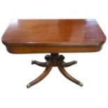 A Victorian mahogany folder over side table, the rectangular twist top supported on a turned