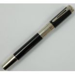 A Waterman Elegance rollerball pen, model S0891410, with black lacquer body and silver plated