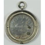 Of Welsh Eisteddfod interest; a Victorian silver presentation medal, by George Unite, Birmingham