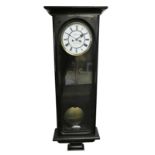 A. Fattorini, Harrogate, an ebonised Vienna style wall clock, the white enamel two part dial with