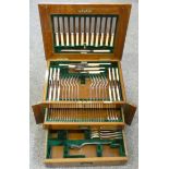 An Edwardian electroplated canteen of Old English rat tail pattern cutlery for twelve place